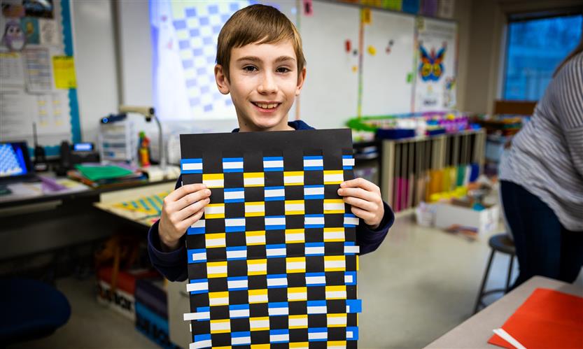 Students make kente cloths